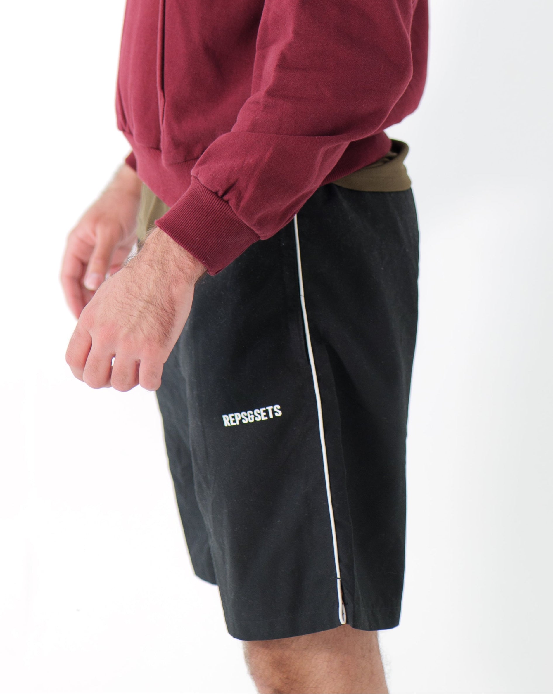 Black and white performance sports shorts front view